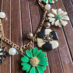 Green and Black Floral Charm Necklace with Gold Accents